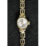 A lady's Rotary 9ct gold wristwatch, silvered dial, baton markers, manual movement,