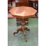 A 19th century Maltese walnut and marquetry octagonal tripod centre table,