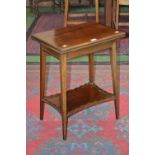 An Edwardian mahogany card table, by Howard & Sons, London, folding top,