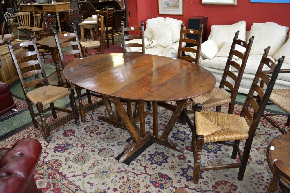 A Monastic oak drop leaf table;