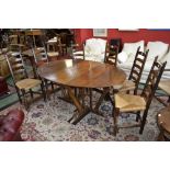 A Monastic oak drop leaf table;