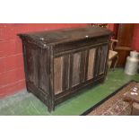 A large French dome top chest, hinged cover, panelled front, stile feet.