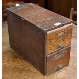 A small oak desk top two drawer index card cabinet.