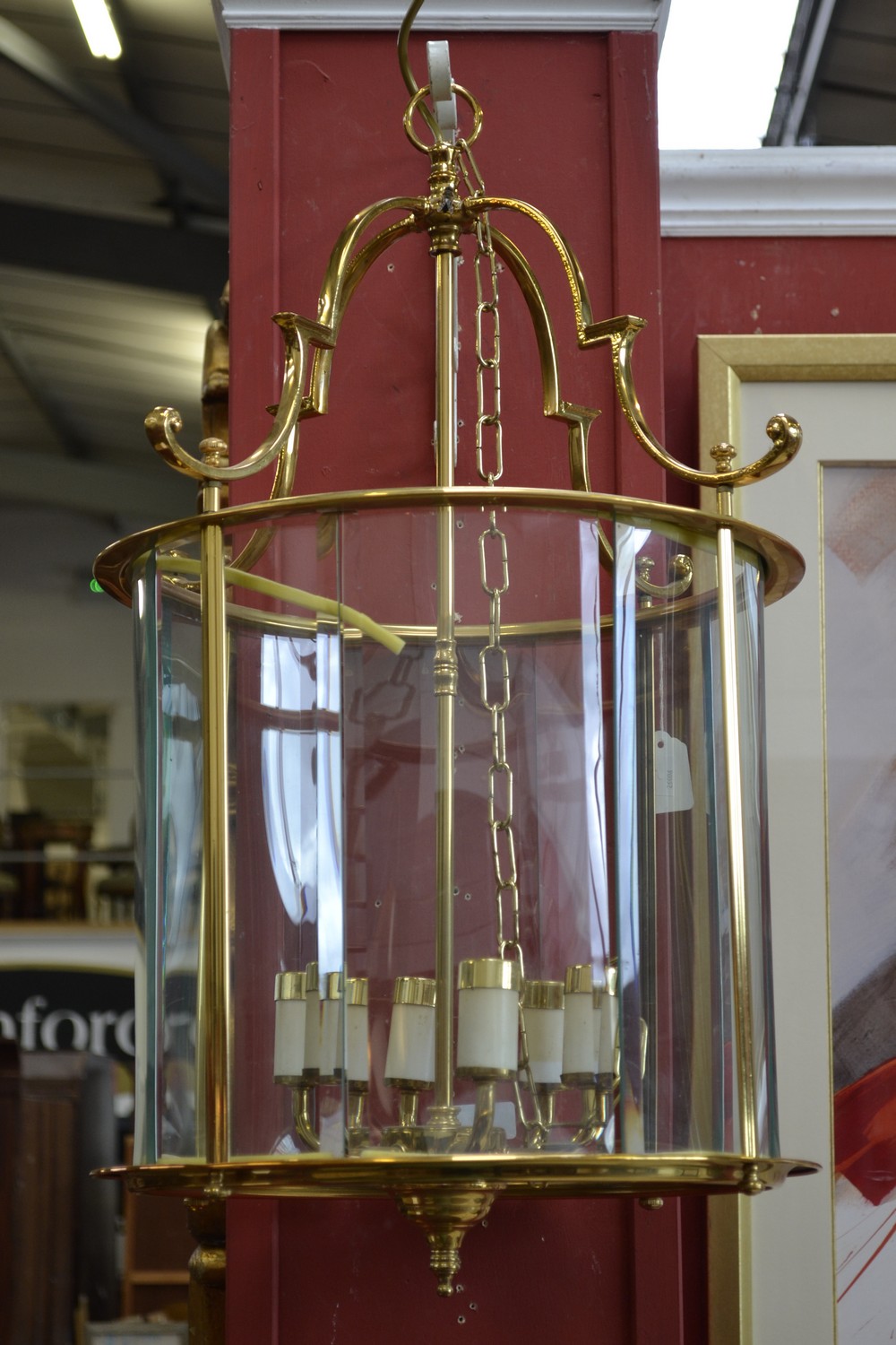A large brass cylindrical six light hall lantern,