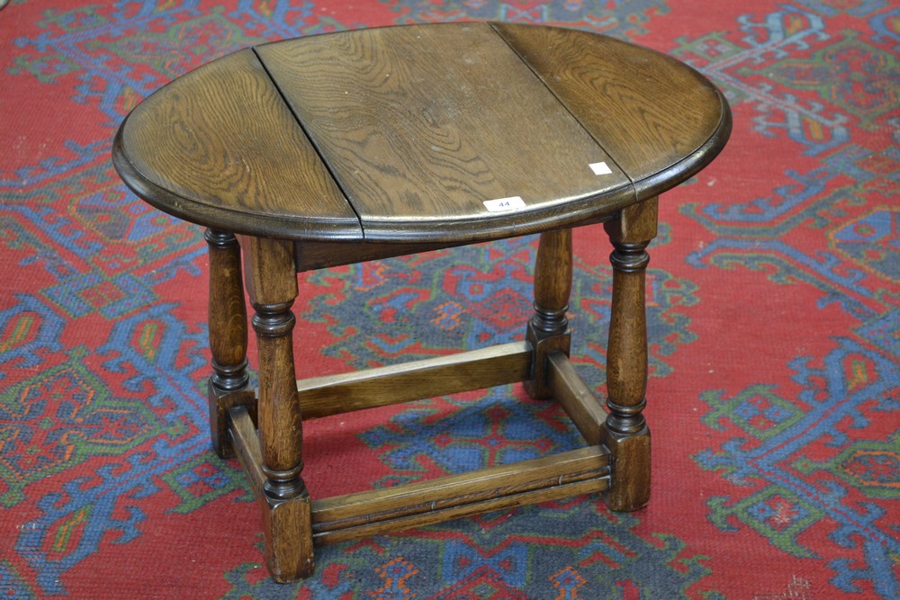 An oak dropleaf occasional table