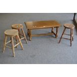 Three early 20th century oak stools;