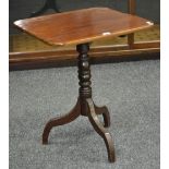 A William IV mahogany tilt top table, moulded top, turned column, cabriole legs,