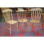 Two elm lath back country dining chairs; a spindleback kitchen chair, circular seat,