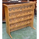 A pollarded oak wine rack in the manner of Stewart Linford