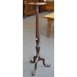 A 19th century mahogany tripod torchere or statuary pedestal,