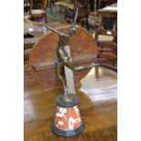 An Art Deco bronze dancing girl on rouge marble base