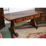 A Victorian flame mahogany sofa table, radiused drop ends, two short drawers to frieze,