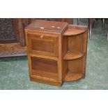 A 1940's bedside fall front cabinet bookcase.