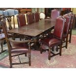 An Old Charm style large draw leaf table with carved cup and cover supports,