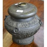 A 19th century Chinese bronze lamp