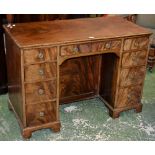 A George III mahogany kneehole desk, c.