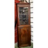 A 19th century mahogany floor standing corner cupboard,