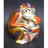 A Royal Crown Derby paperweight Monkey and baby,