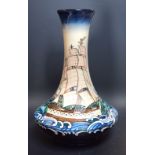 A large Moorcroft bottle vase, by Paul Hilditch, signed, decorated with ships on choppy seas,