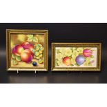 An English Porcelain rectangular plaque, painted by Leaman, signed with yellow primroses and tulips,