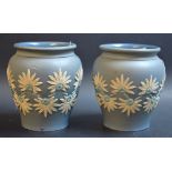 A pair of Doulton silcon ware blue vases, sprigg decorated with flowers, impressed marks,