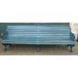 A Victorian Coalbrookdale style cast iron and slatted wood garden bench, acanthus scroll ends,