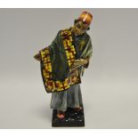 A Royal Doulton figure, Carpet seller,