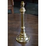 A heavy brass column desk lamp