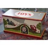 A toy box decorated in relief with Thomas the tank engine etc.