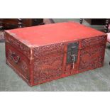 A Chinese red lacquered rectangular travelling trunk or document box, hinged cover, brass hasp,