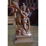 An Indian carved wood figure