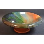 A Torquay ware circular comport, dished top glazed in merging colourful tones,