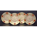 A set of four Abbeydale Chrysanthemum pattern dinner plates,