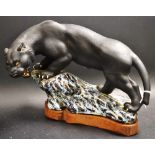 A Chinese stoneware Black Panther model,