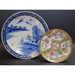 A blue and white oriental charger,