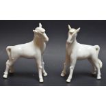 A pair of Chinese blanc de chine models, of horses, modelled in the Tang manner, both standing,