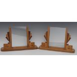 A pair of Art Deco satinwood and mahogany glazed photograph frames,