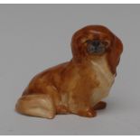 A Royal Worcester animal model, of a Pekinese dog, printed crown and circle mark in black,