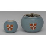 A Carlton Ware University of Cambridge tobacco jar and match strike,