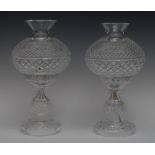 A pair of Waterford crystal side lamps, the globular shaped hobnail cut, baluster stems, 35.