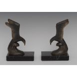 A pair of French spelter bookends, cast with stylised gulls, black veined marble bases, 17.