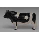 A Beswick Friesian bull, CH Coddington Hilt Bar, modelled by Arthur Gredington, 12cm high,
