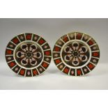 A pair of Royal Crown Derby 1128 dinner plates (2)