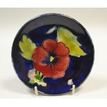 A Moorcroft pansy pattern circular dish,