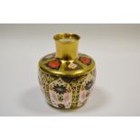 A Royal Crown Derby 1128 pattern vase, all gold border, 11cm high,