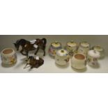 A Beswick Bay Mare; a Beswick Foal; six Poole preserve pots;