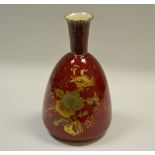 A Derby Crown Porcelain mallet shaped vase, gilt floral design, red body,