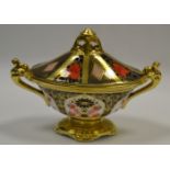 A Royal Crown Derby 1128 pattern two handled vase and cover, all gold border,