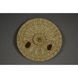 A William IV ink manuscript perpetual calendar, inscribed on card, revolving centre,