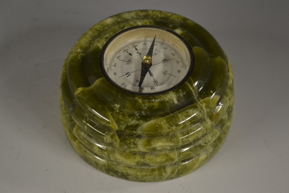 A green marble desk compass, blued steel indicator, ribbed border, 8.